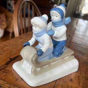 Children Sledding Porcelain Figurine- Paul Sebastian